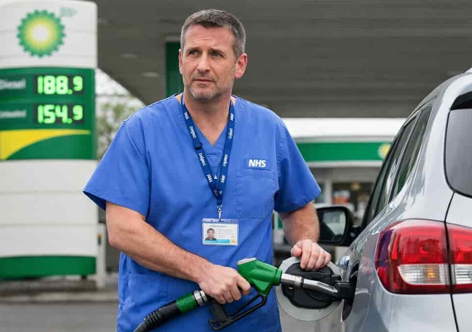 NHS worker refueling at BP station