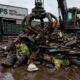 Industrial scrapyard accident scene